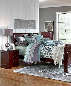 cherry wood dressers and bedframe